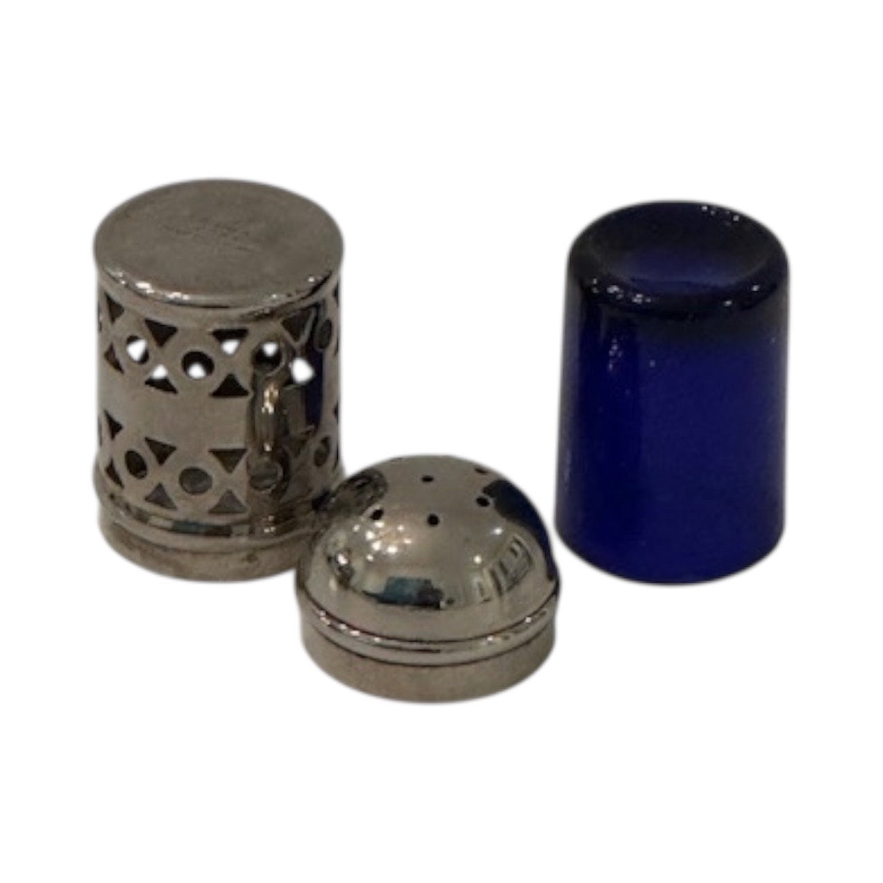 Antique EPNS shaker disassembled into pierced silver body, domed cap, and cobalt blue glass liner