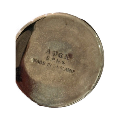 Close-up of a shaker base with maker's mark reading EPNS Made in England