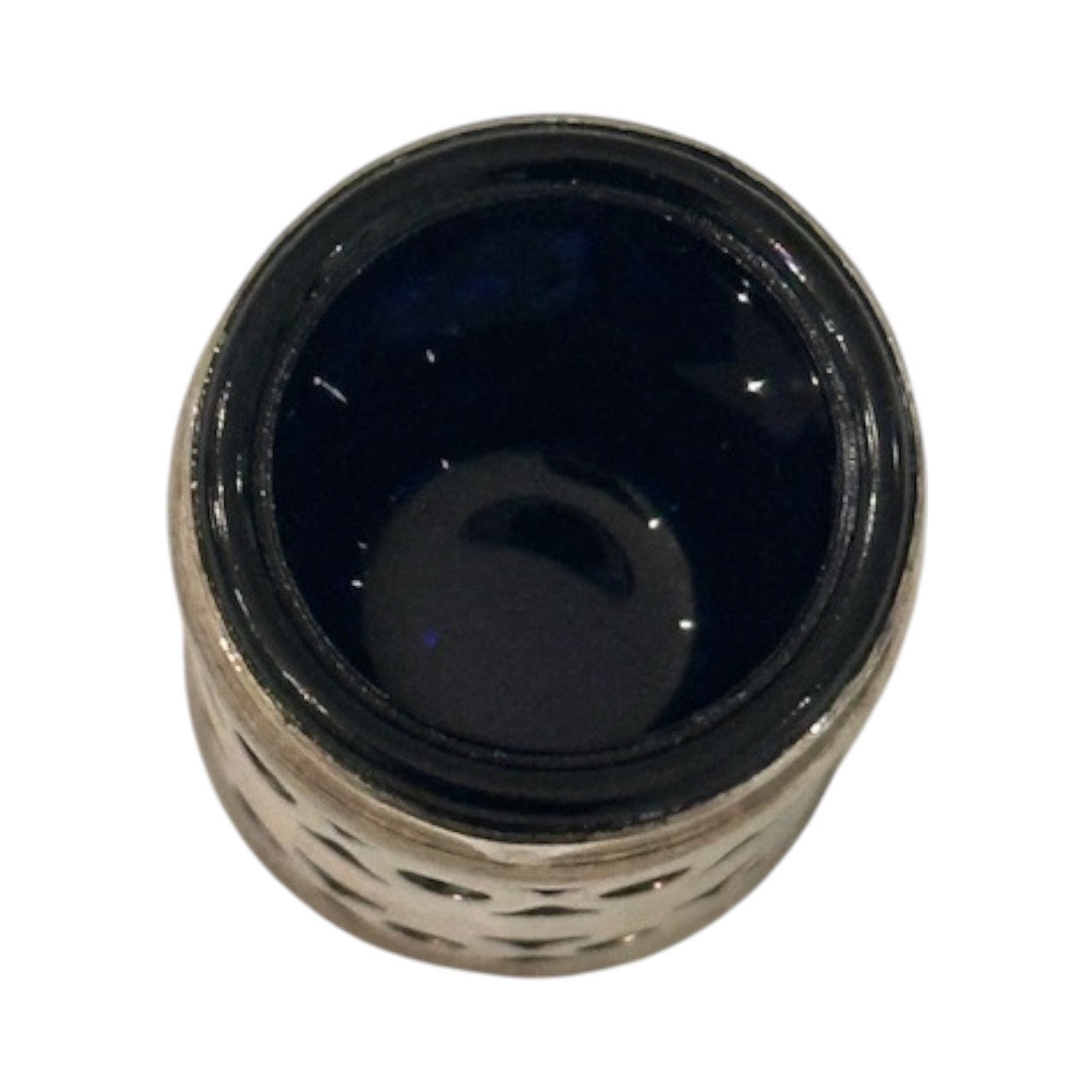 Top-down view into a pierced EPNS shaker revealing its cobalt blue glass liner