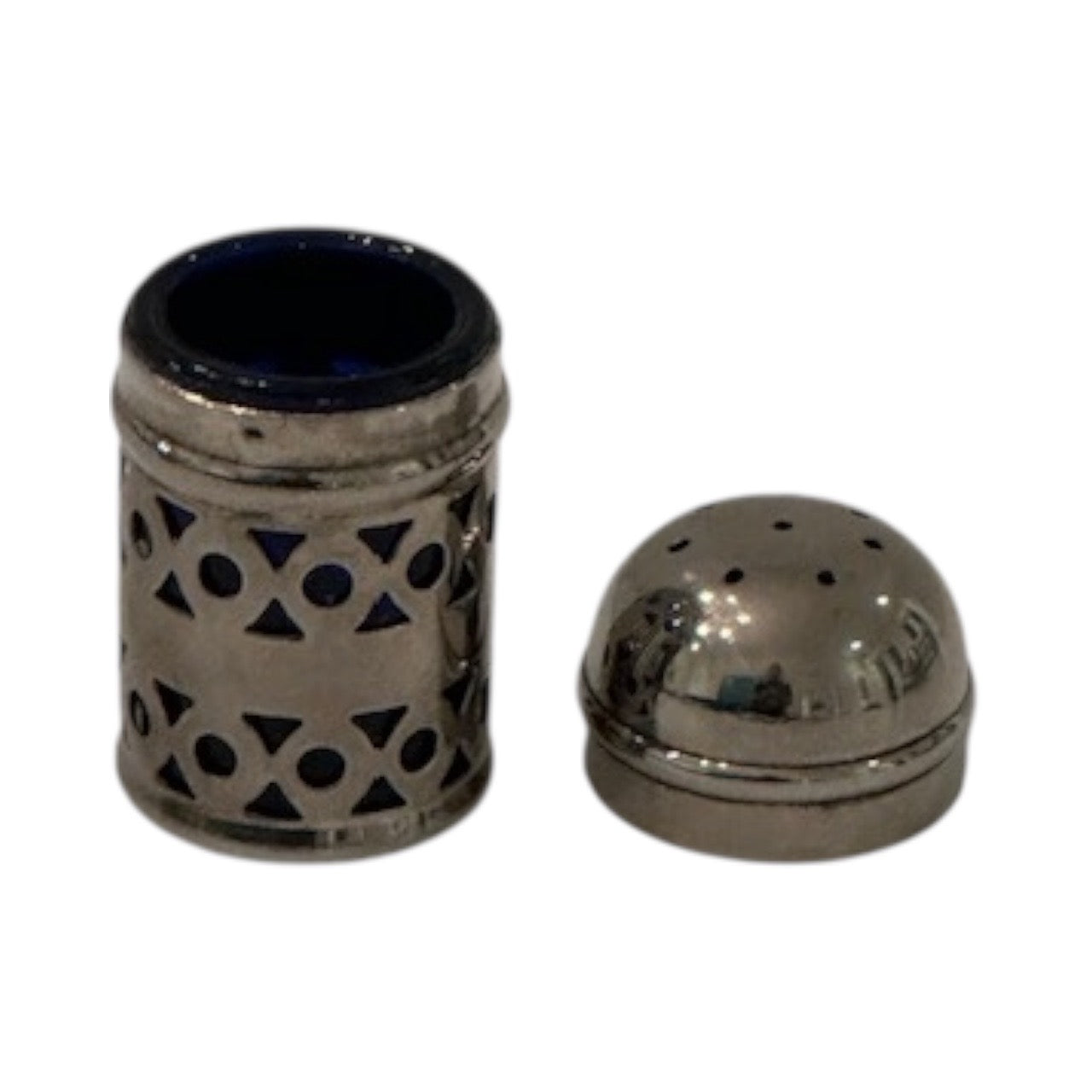 Pierced silver EPNS shaker with cobalt blue glass liner inside, domed cap set alongside