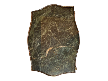 Top-down view of the side table's green veined marble top