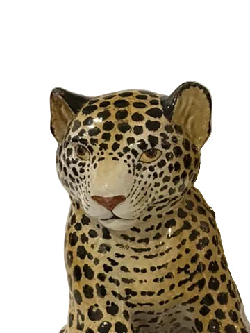 Close-up of majolica leopard's hand-painted face with detailed spotted markings