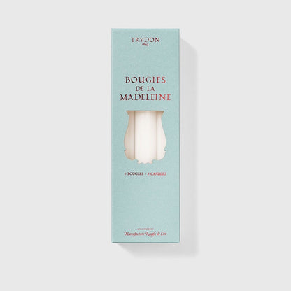 Trudon Bougies de la Madeleine box in pale blue with white taper candles shown through cutout, 6 candles