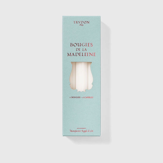 Trudon Bougies de la Madeleine box in pale blue with white taper candles shown through cutout, 6 candles
