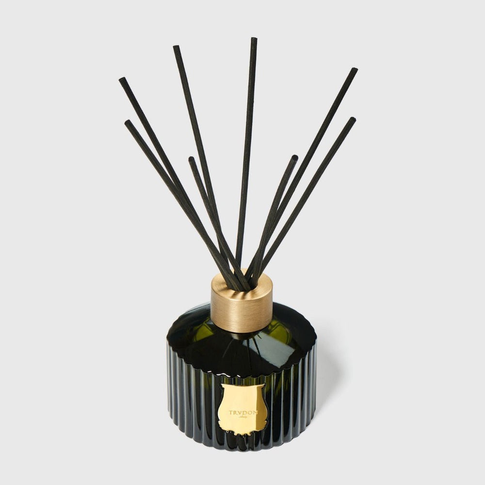 Trudon Cyrnos diffuser, dark green ribbed glass bottle with black reeds and gold crest
