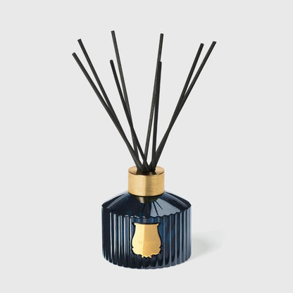 Trudon Reggio diffuser, navy ribbed glass bottle with black reeds and gold Trudon crest