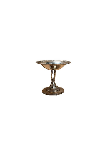 Vintage silver plate footed compote, shallow scalloped-rim bowl on a baluster stem and domed foot.