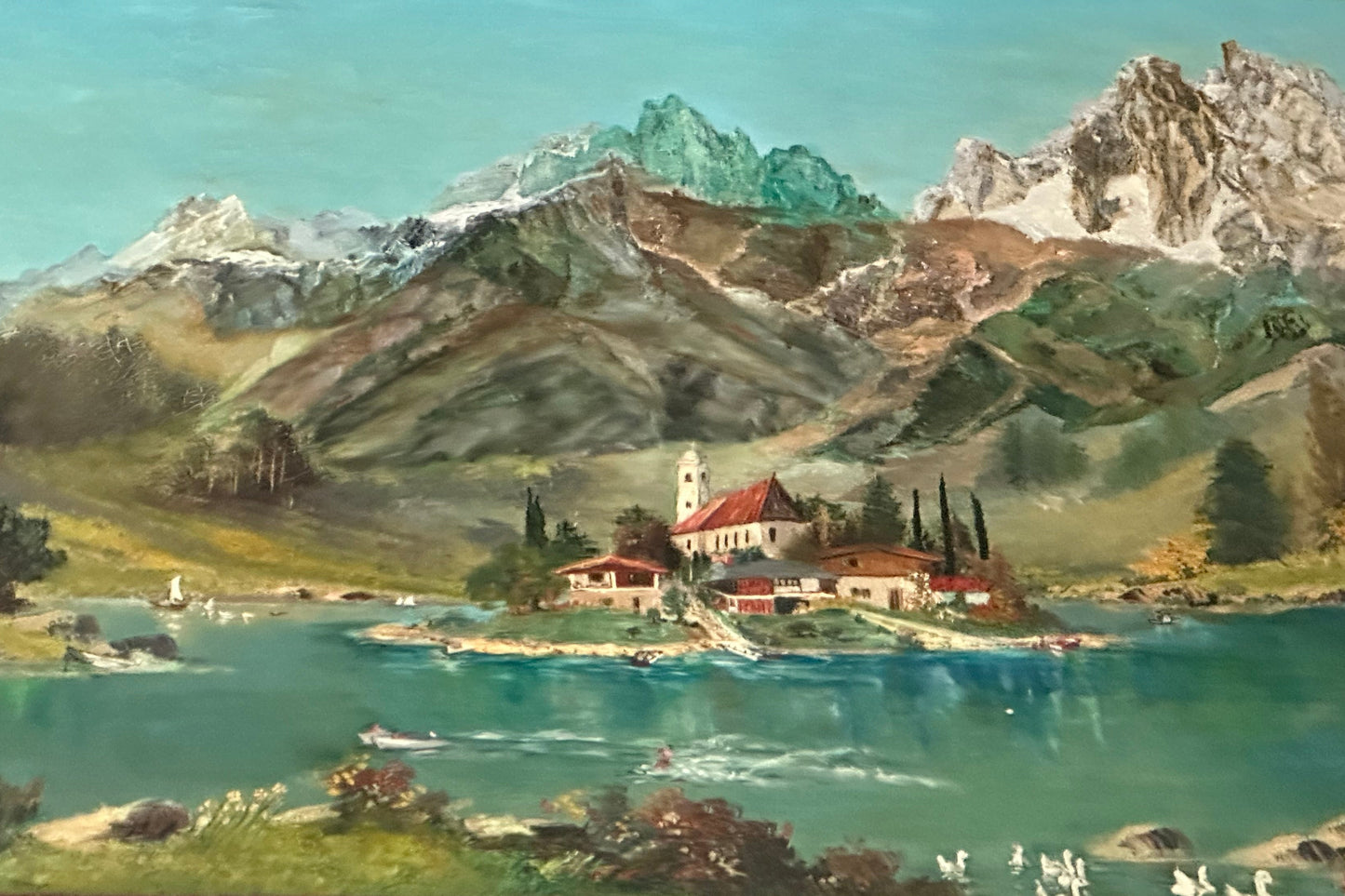 Vibrant oil painting of an alpine lake with an island church village and snow-capped mountains over turquoise water.