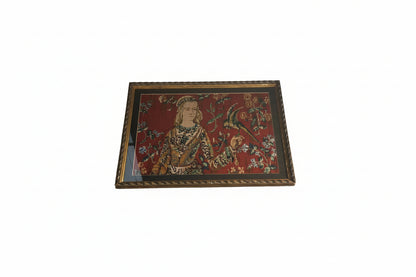 Restored framed needlepoint of a medieval lady with a bird, angled view in gilt frame