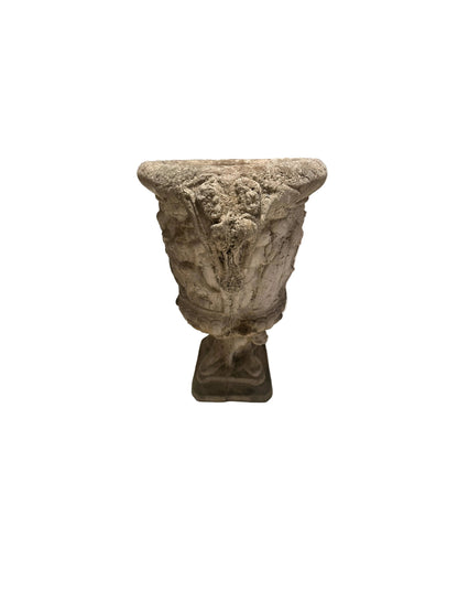 Concrete Regency urn, front angle showing classical figural relief and aged surface