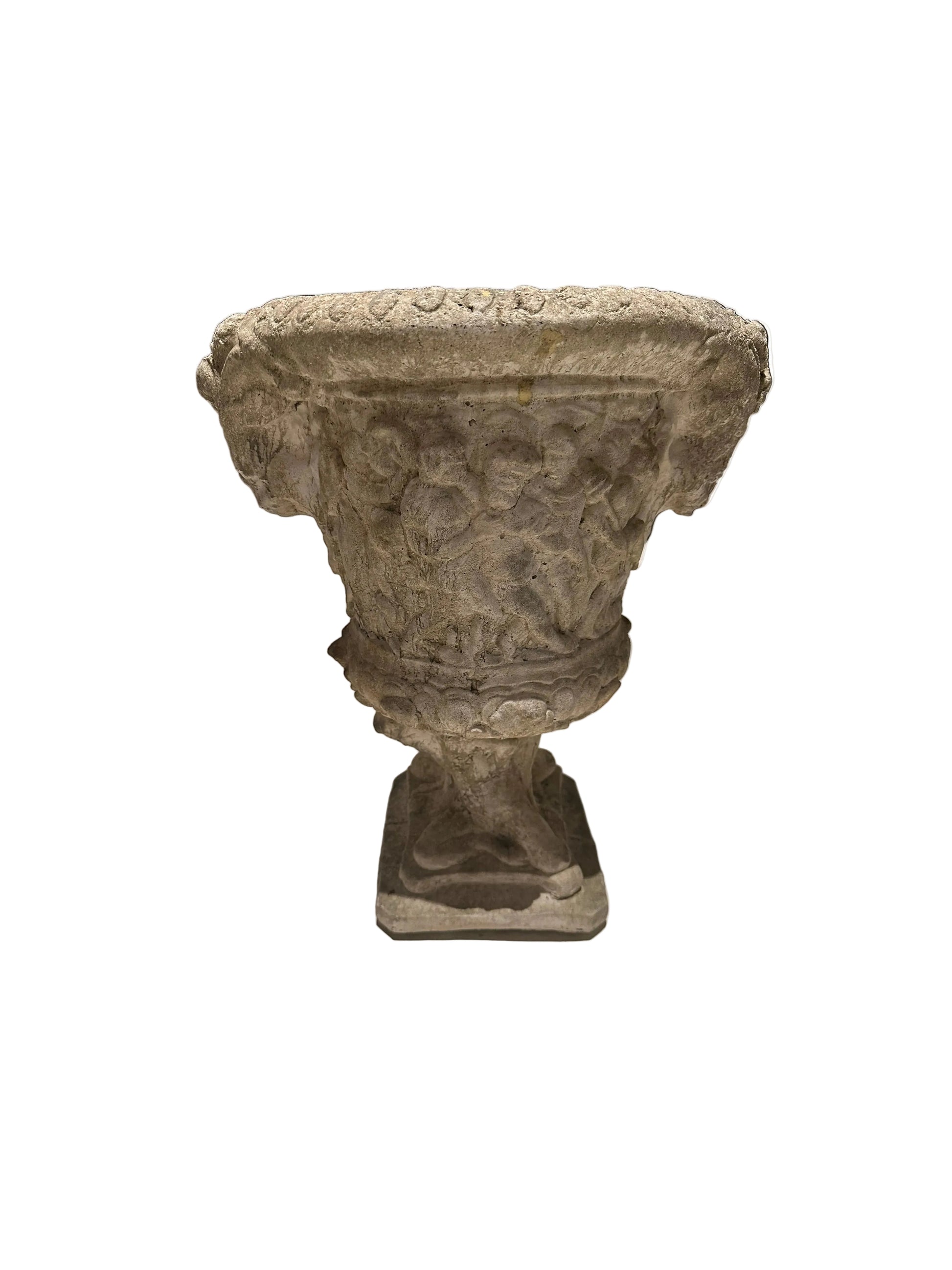 Vintage concrete Regency urn, front view of weathered figural relief on square pedestal base