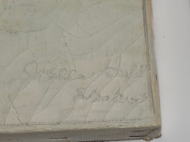 Close-up of the canvas corner showing the artist's signature scratched into the painted edge