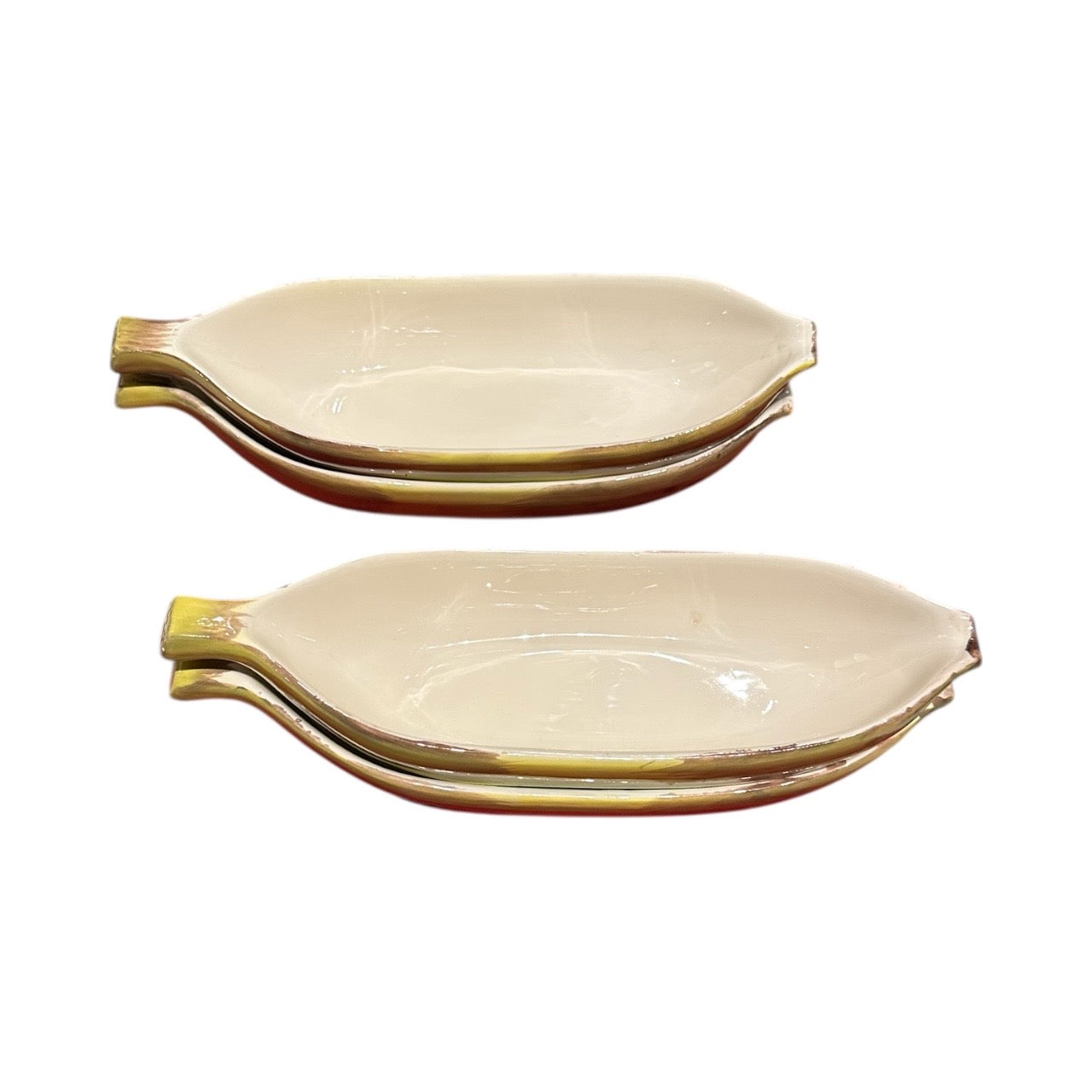 Two pairs of stacked yellow banana split bowls in profile showing curved boat shape and stem ends.