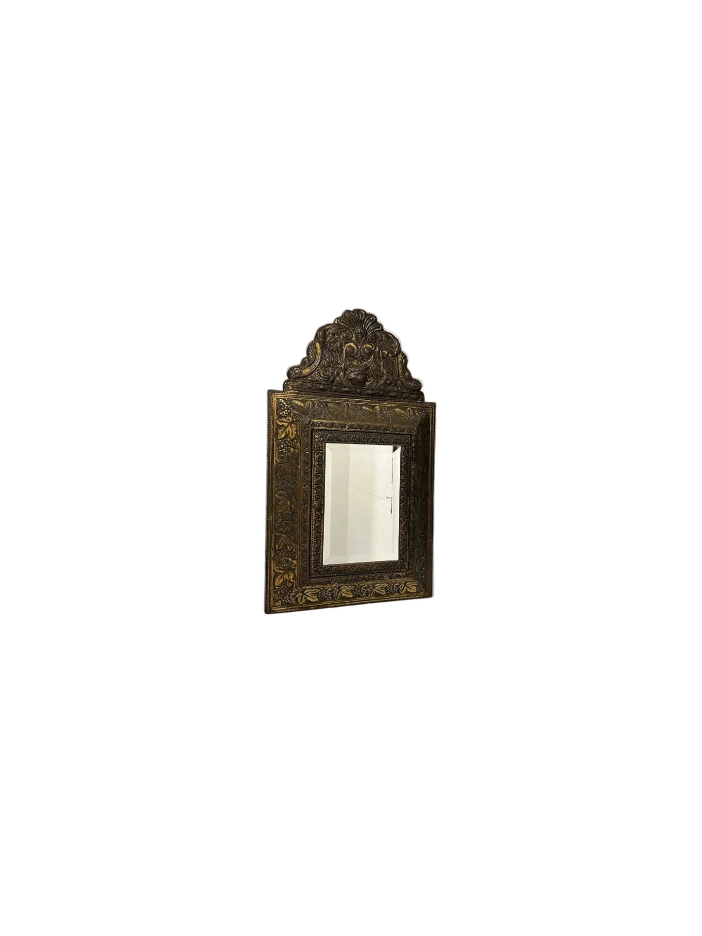 Antique 1930s brass wall cabinet open, showing two embossed clothes-care brushes inside.