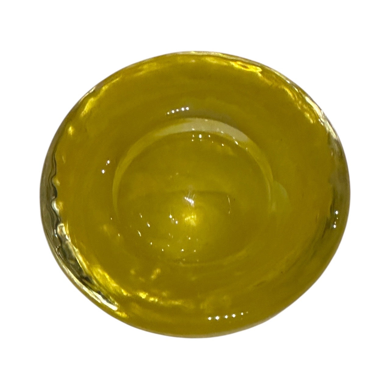 Overhead view of the citron-yellow blown glass bowl interior
