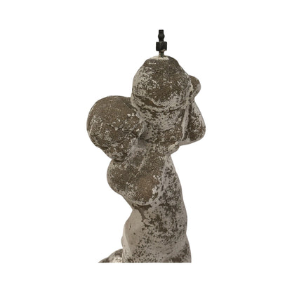 Rear view of concrete fountainhead figure's head fitted with a black water spout