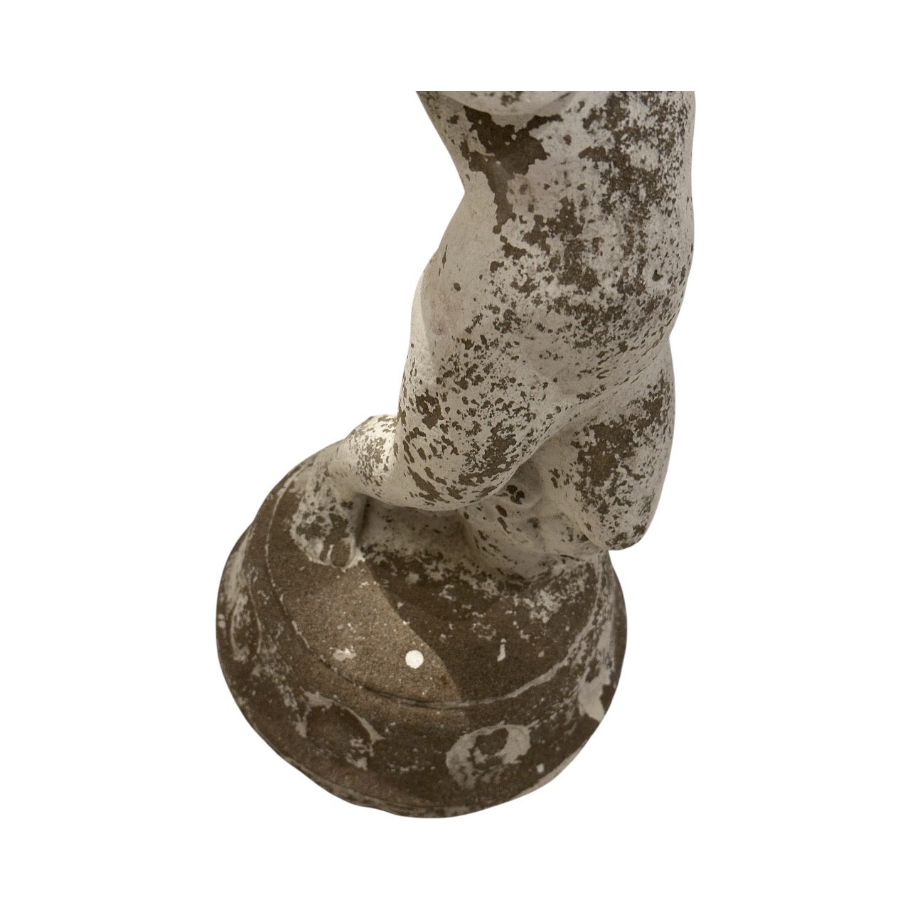 Close-up of the lower legs and round pedestal base of the concrete fountainhead figure