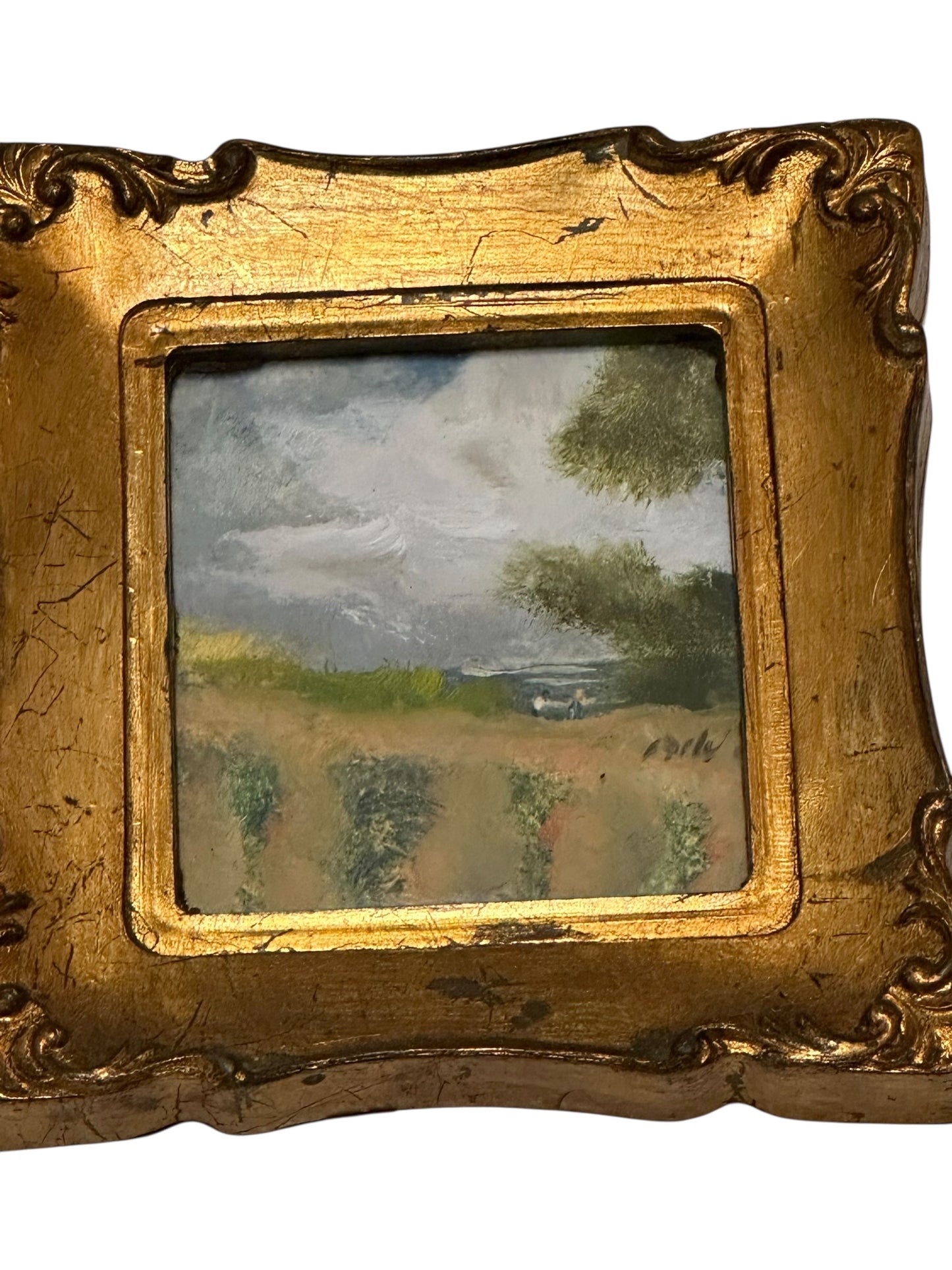 Italian gilt-framed miniature painting of a cloudy countryside with trees and vineyard rows