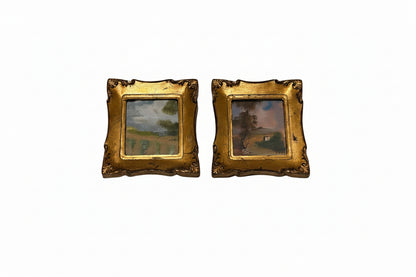 Pair of Italian gilt-framed miniature landscape paintings displayed side by side on white