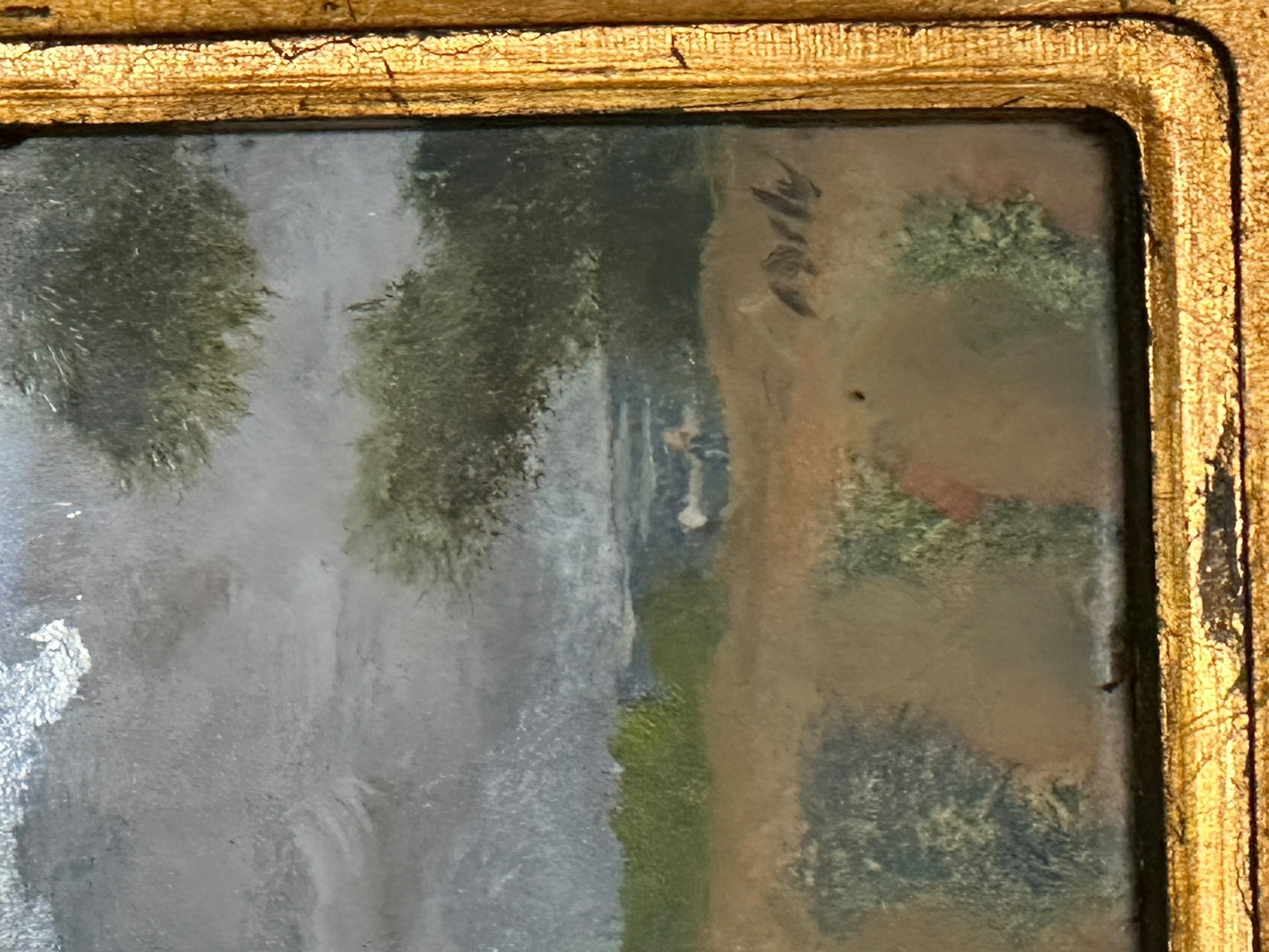 Close-up detail of one miniature landscape painting showing brushwork of trees and field