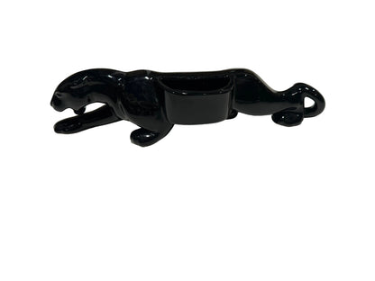 MCM McCoy black glazed ceramic panther planter, side view showing rectangular planter opening on the back