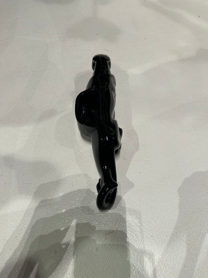 MCM McCoy black glazed ceramic panther planter, rear view of curled tail and prowling body