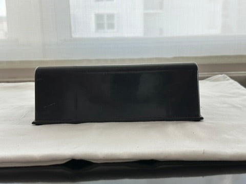 MCM Bar Guide rear view showing solid black wedge back, on white cloth