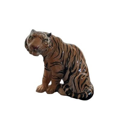 Vintage Italian ceramic tiger figure, seated glossy tiger in three-quarter side view