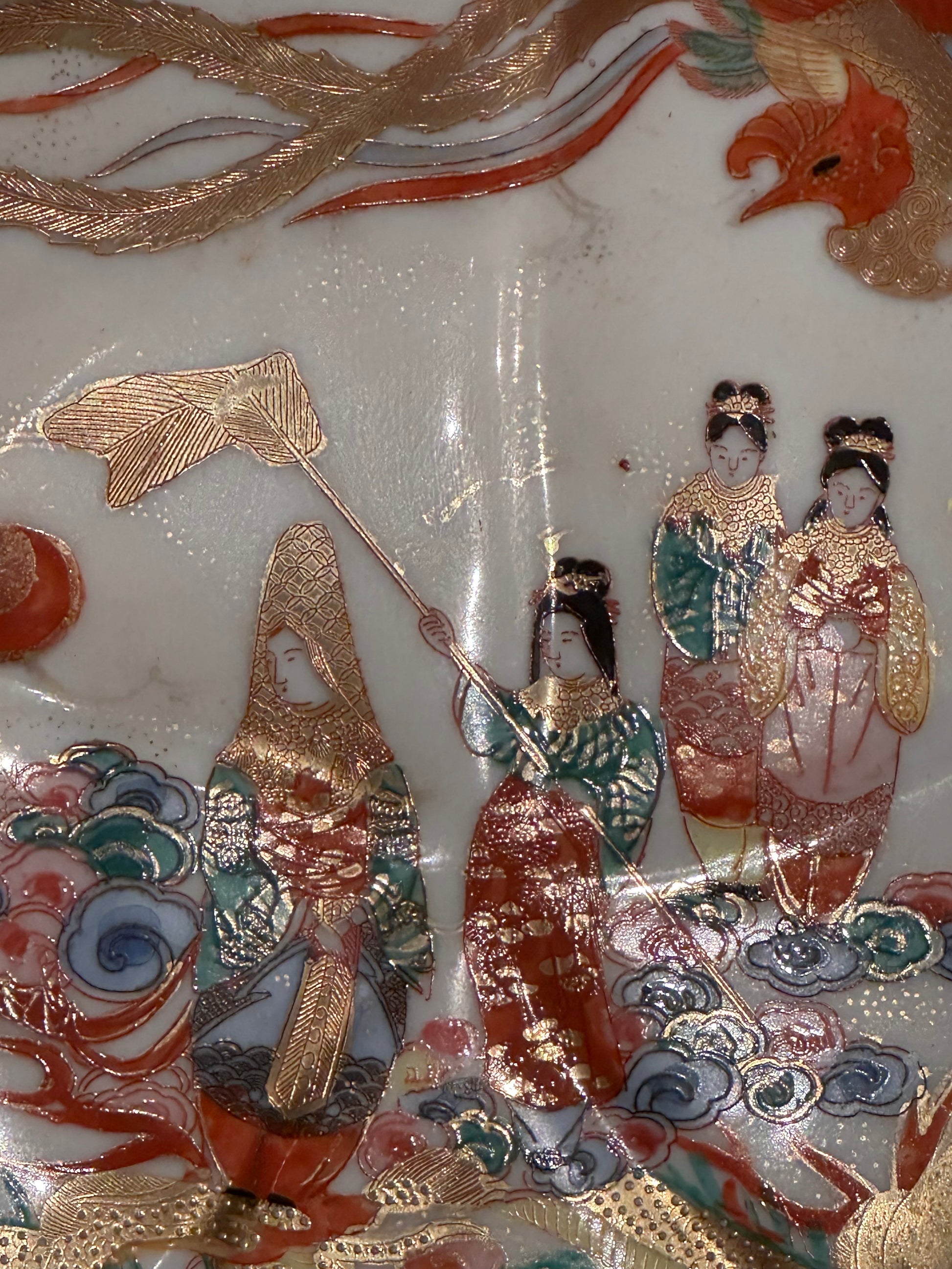 Japanese Kutani porcelain dish, detail of hand-painted gilt figures in robes with phoenix