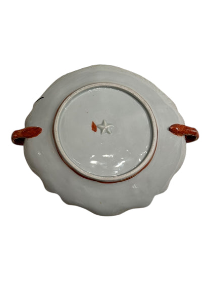 Japanese Kutani porcelain dish, underside showing white glaze and molded star foot mark