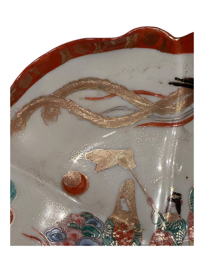 Japanese Kutani porcelain dish, detail of gilt phoenix, fan and figure decoration on rim