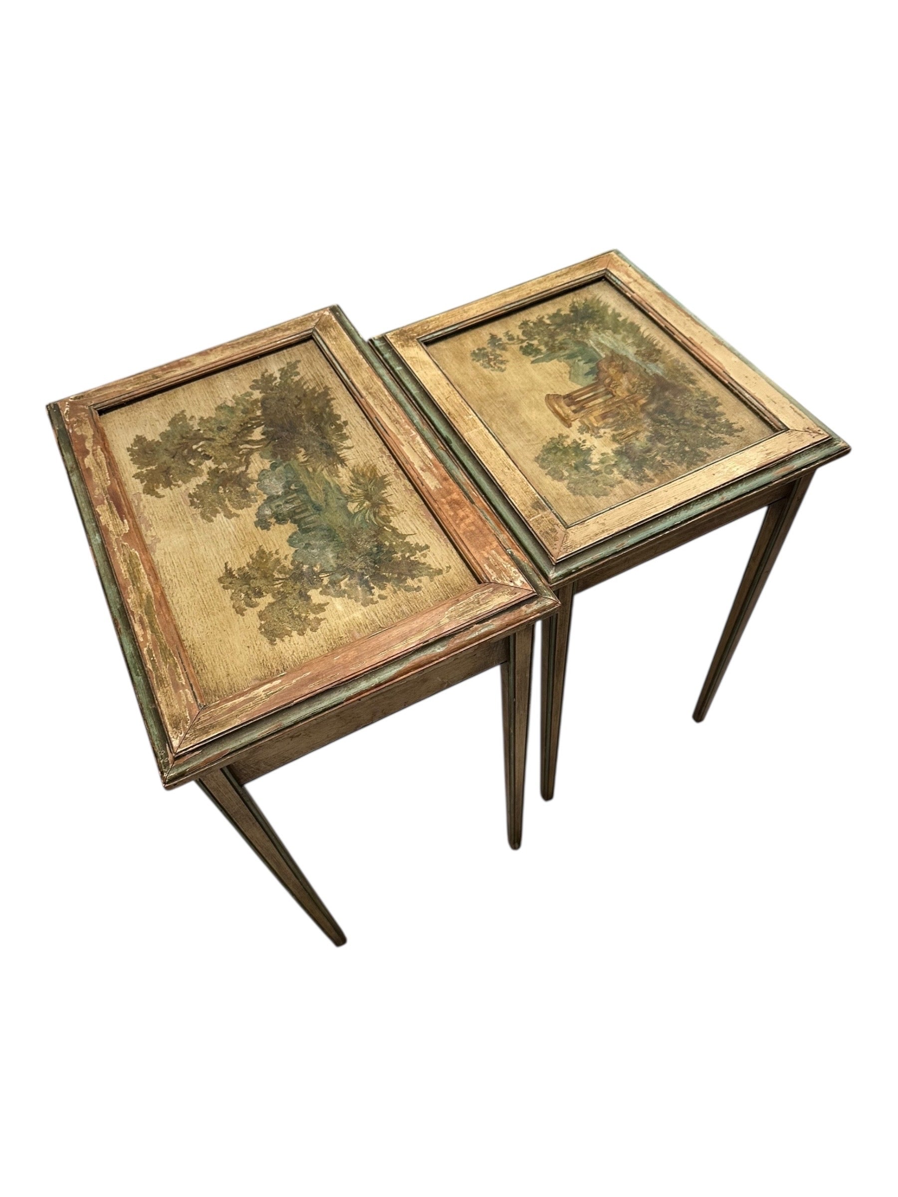 Top-down view of both nesting tables with hand-painted pastoral scenes.