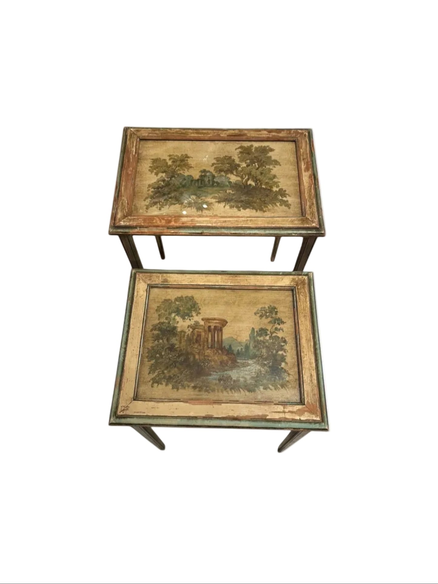 Pair of antique Venetian-style nesting tables with hand-painted pastoral landscape tops under glass.
