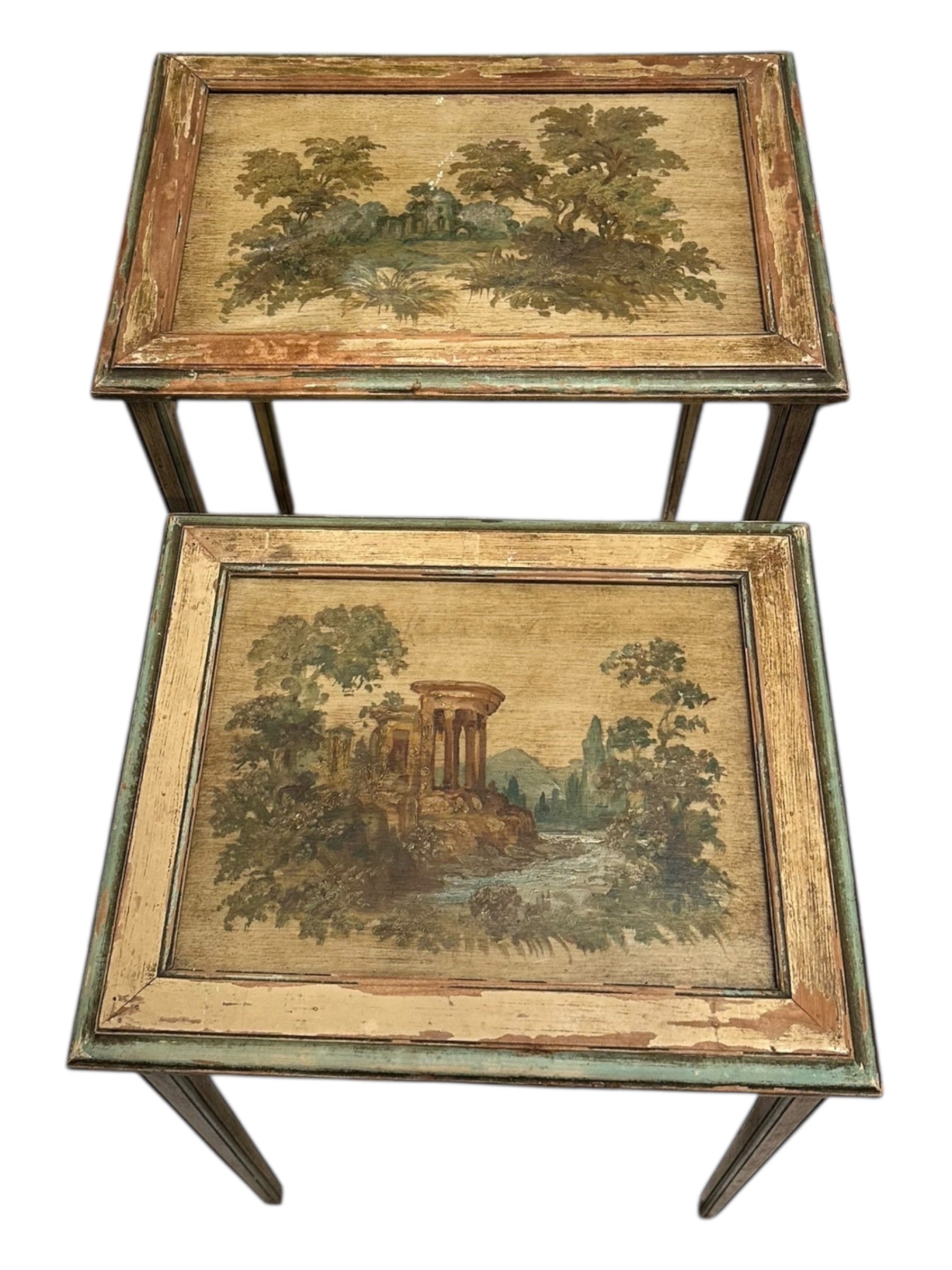 Venetian-style nesting tables, front view, painted scene of classical ruins by a river under glass.
