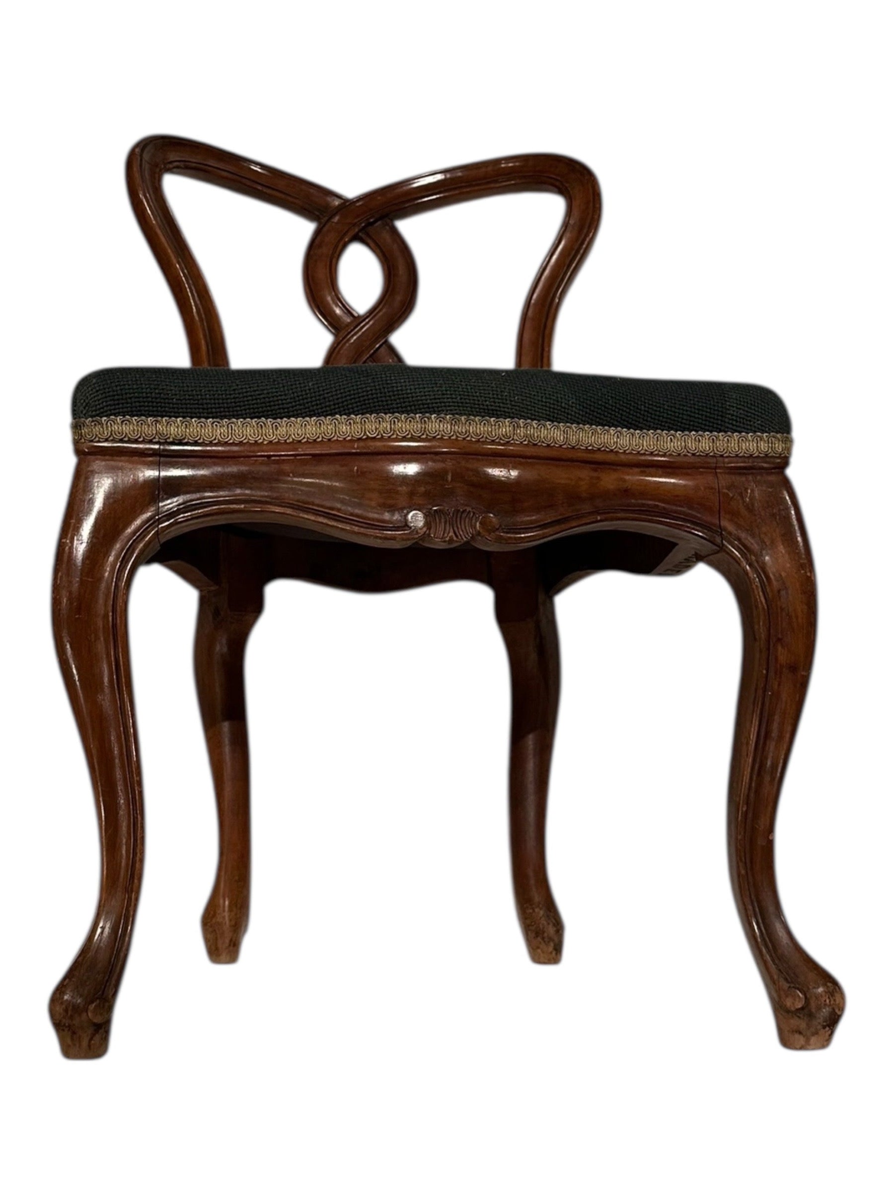 Walnut pretzel-back boudoir chair, rear view showing carved looped backrest