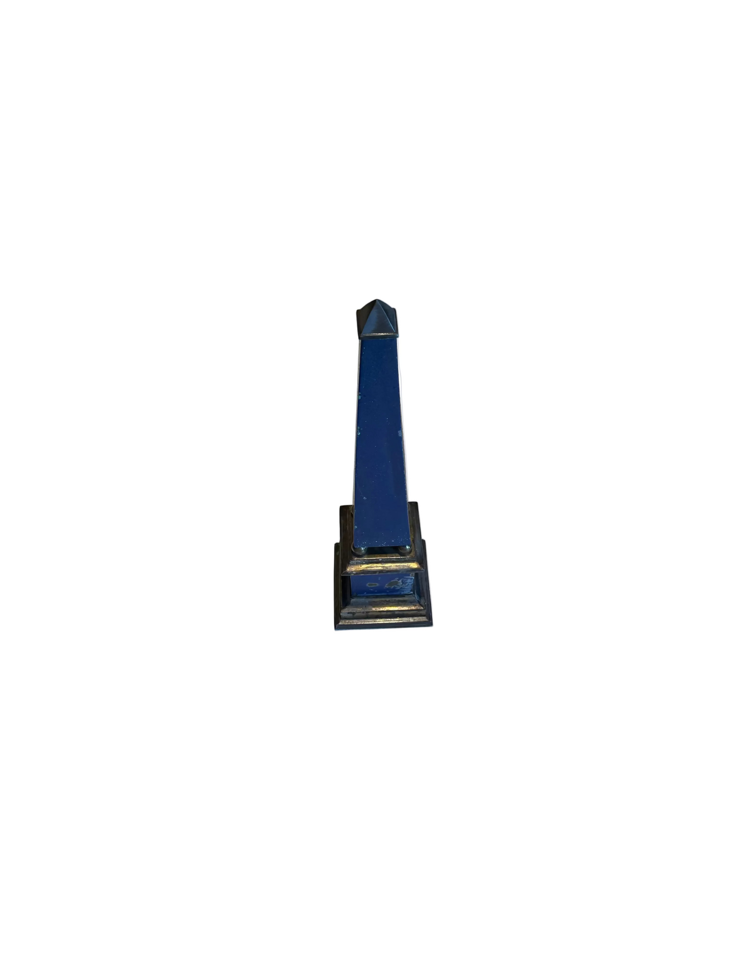 Blue faux-painted brass obelisk with pyramid cap on tiered base, full front view