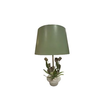 Vintage tole tulip and alabaster lamp fitted with a sage green shade, showroom view