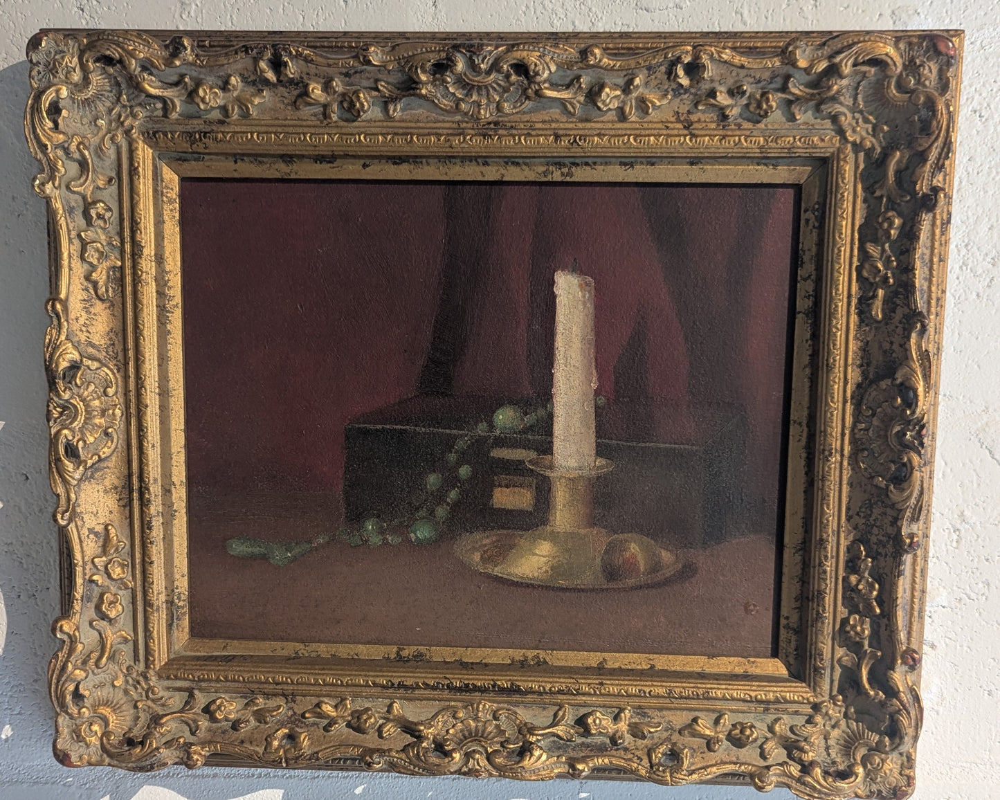 Closer angled view of the gilt-framed candlestick still-life oil painting