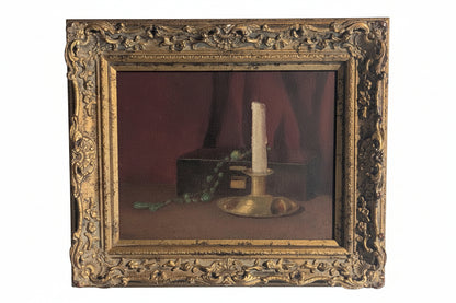 Antique oil-on-board still life of a brass candlestick, dark box and green beaded rosary in a gilt frame