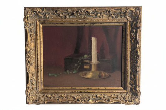 Antique oil-on-board still life of a brass candlestick, dark box and green beaded rosary in a gilt frame