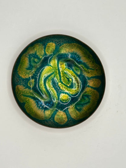 Doris Hall small green enamel dish, overhead view of green-yellow swirl with blue accents