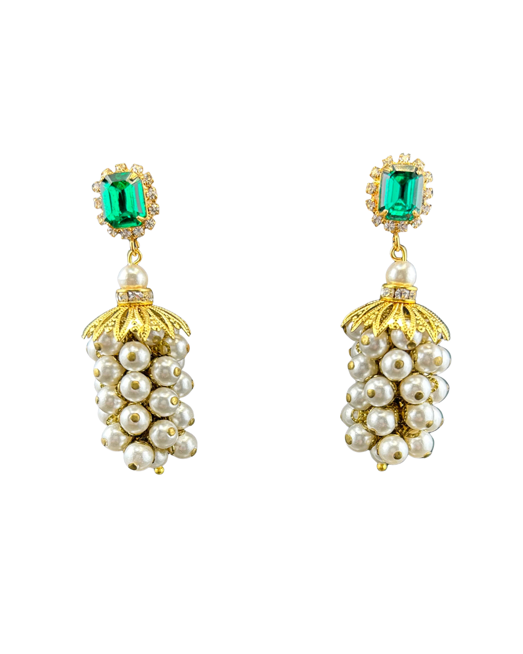 Pearl cluster drop earrings with emerald-green rhinestone tops and gold caps, on white background