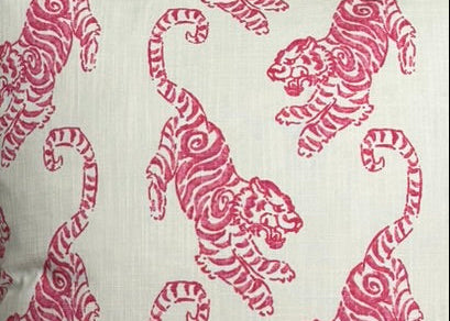 Close-up of the pink tiger block-print linen fabric on the 22-inch throw pillow