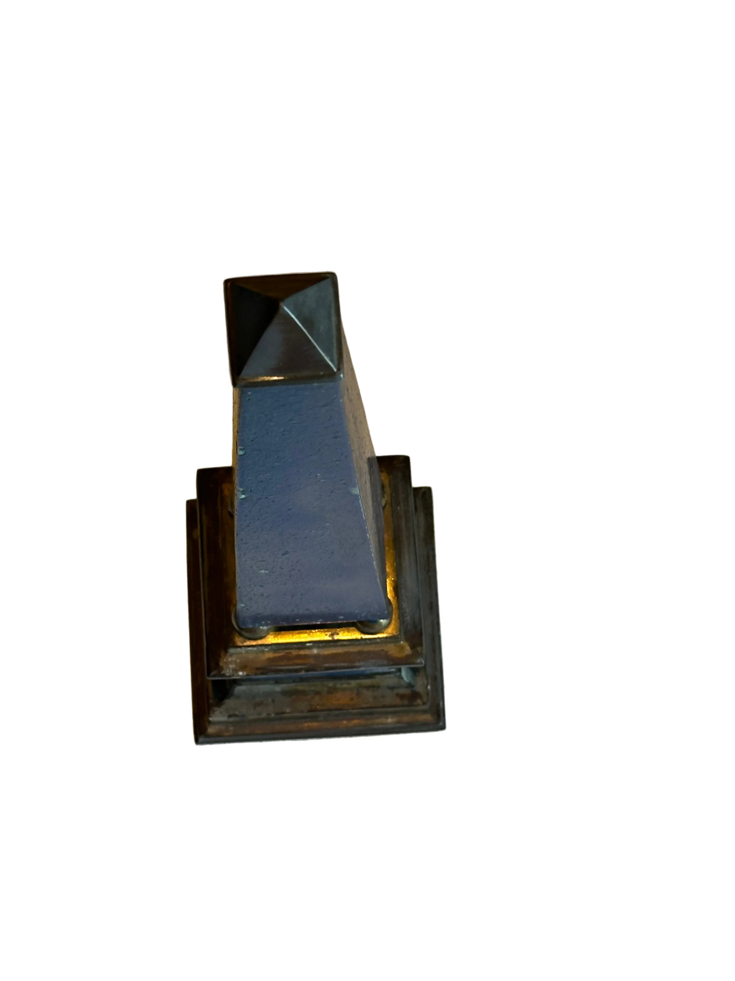 Top portion of blue faux-painted brass obelisk showing pyramid cap and stepped plinth