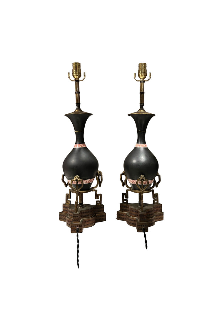 Pair of black neoclassical lamps from the reverse, plain bodies with red Greek-key bands