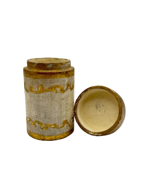 Florentine vanity canister open, lid resting on its side showing the hollow interior.