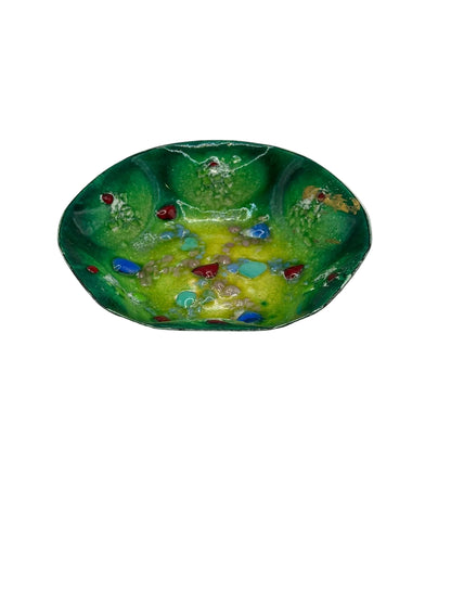 Vintage MCM green enamel dish with fused glass stones, three-quarter angled view