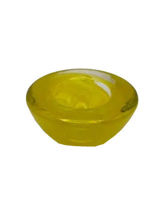 Angled view of a small freeform citron-yellow blown glass bowl