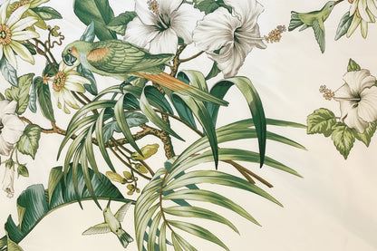 Brunschwig & Fils Anima tropical print: green parakeet, white hibiscus and hummingbirds on cream ground