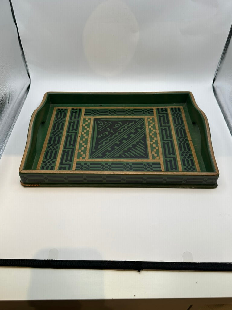 Green wood serving tray in light box, shallow form with shaped cutout handles, top view